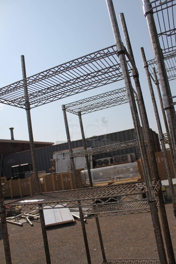 Chrome Finish 3 Tier Wire Shelving Unit. BUYER MUST DISMANTLE. PCI CANNOT DISMANTLE FOR SHIPPING. PLEASE CONSIDER FREIGHT CHARGES. - Image 2 of 3