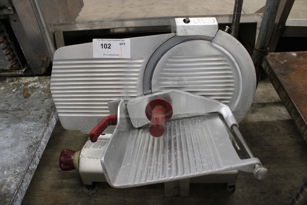 Fleetwood Model EF 12 Metal Commercial Countertop Meat Slicer w/ Blade Sharpener. 115 Volts, 1 Phase. 23x20x17. Tested and Working!