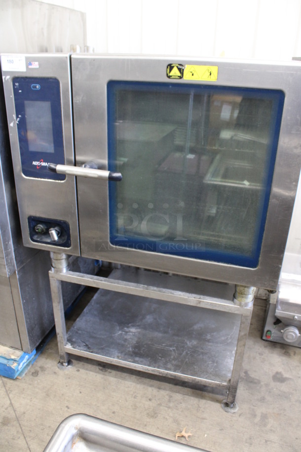 Alto Shaam Model CTP7-20E Stainless Steel Commercial Combitherm Convection Oven on Stainless Steel Commercial Equipment Stand. 208-240 Volts, 3 Phase. 43.5x42x63.5