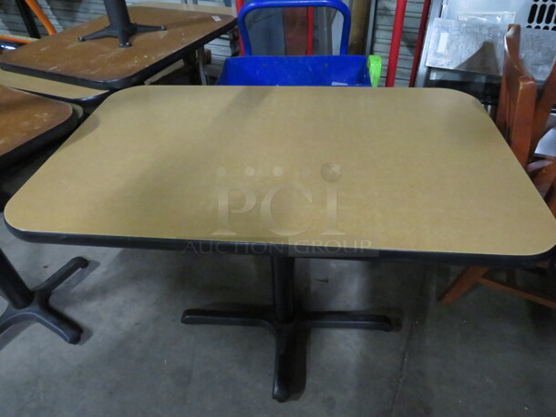 One Brown Laminate Table Top On A Pedestal Base. 42X26X30 - Image 1 of 2