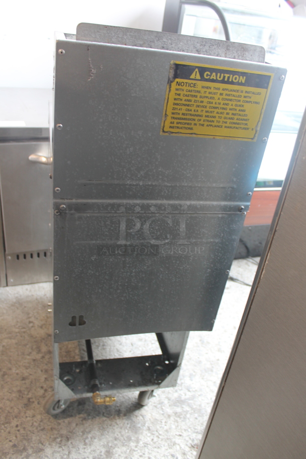 Standard Range SR-F4-LP Stainless Steel Commercial Floor Style Propane Gas Powered Deep Fat Fryer w/ 2 Metal Fry Baskets on Commercial Casters. 120,000 BTU. - Image 6 of 10