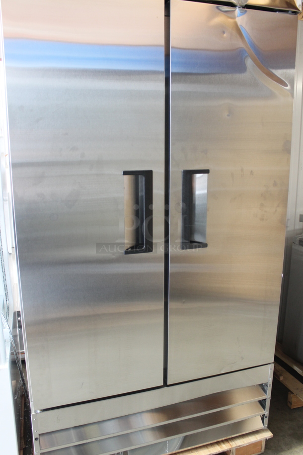 BRAND NEW SCRATCH AND DENT! 2023 Avantco 178A35FHC Stainless Steel Commercial Two Door Reach In Freezer w/ Poly Coated Racks. 115 Volts, 1 Phase. Tested and Working! - Image 3 of 10