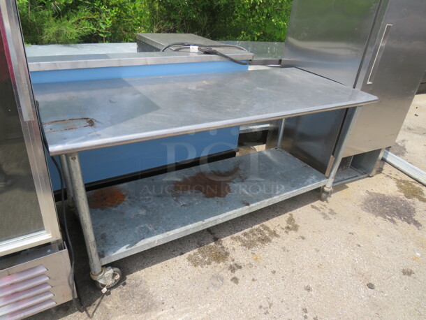 One Stainless Steel Table With Under Shelf On Casters. 72X30X33 - Image 2 of 3