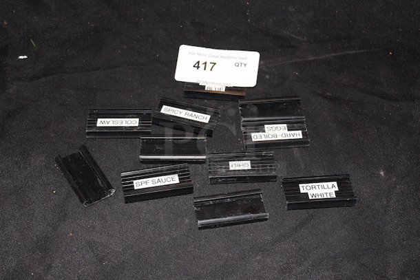 STAY ORGANIZED! Lot of 11 Focus FSHELF3B 3" Plastic Shelf Labels, Black. 1-1/4" Opening For Loading Labels. 
 - Image 1 of 2