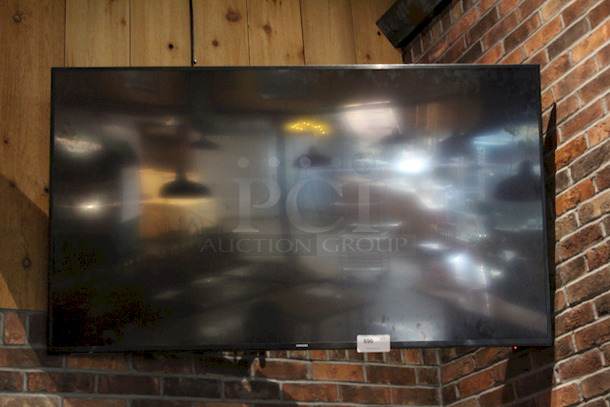 NICE SETUP! 70" Samsung Flat Screen TV With Mount.
Winner Responsible For Removal. - Image 2 of 2