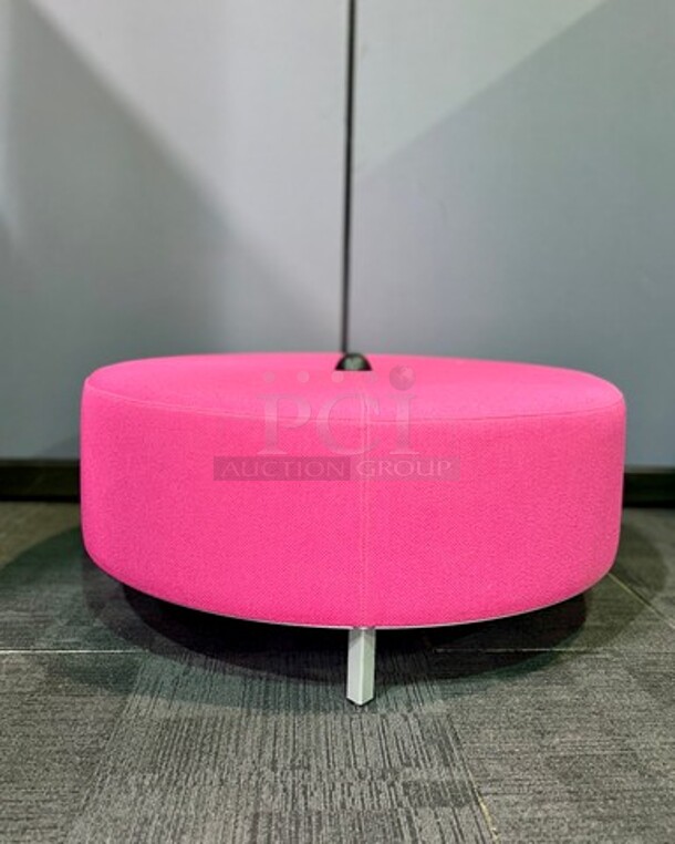 Bright pink ottoman with power source. Silver metal legs support this vibrant colored piece with 4 plugs. In great condition! 44” W x 18.5” H.   - Image 1 of 3