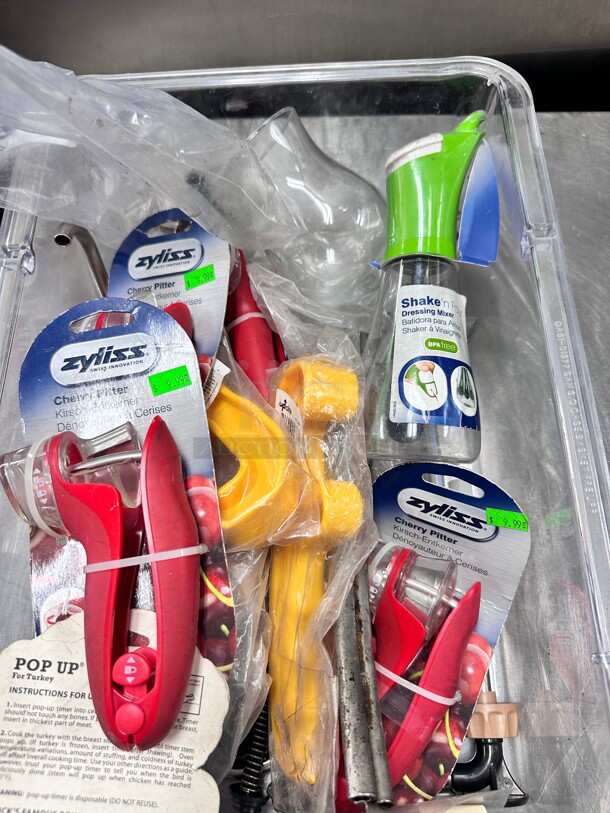 One Lot Of Kitchen Items Includes Dressing Mixer Cherry Pitter and Other Items  - Image 3 of 8