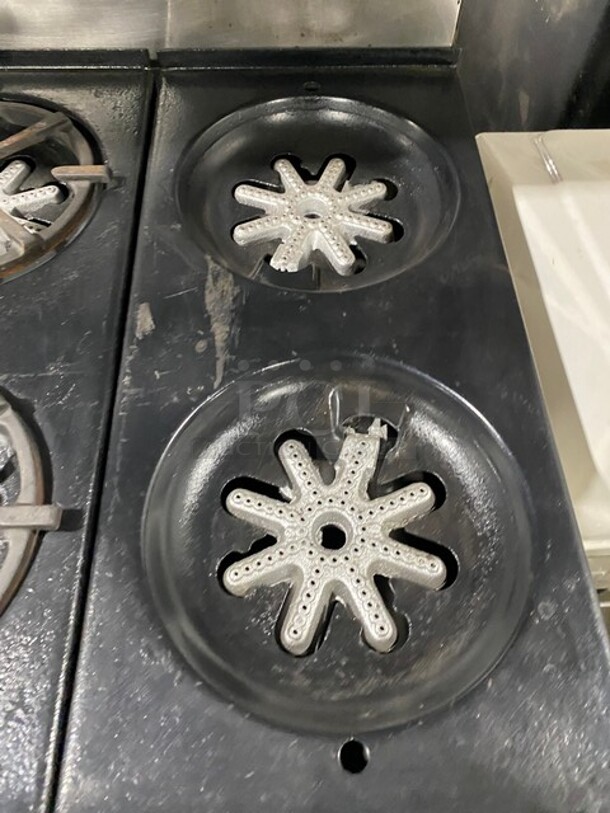 AMAZING FIND! Garland Natural Gas Powered 12 Burner Stove! With 2 Full-Sized Ovens! With Metal Oven Racks! With Raised Back Splash & Salamander Shelf! Stainless Steel! On Casters! - Image 5 of 9