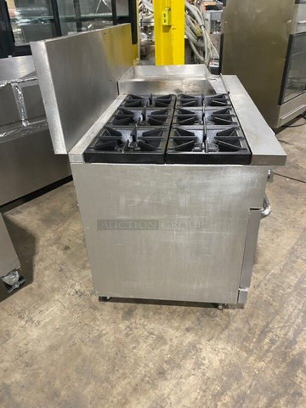 Patriot Commercial Natural Gas Powered 6 Burner Stove With Flat Griddle! Flat Griddle Has Side Splashes! With Raised Back Splash! With 2 Oven Underneath! Metal Oven Racks! All Stainless Steel! On Casters! Model: FMGR6024GNG SN: 17035100006 - Image 3 of 12