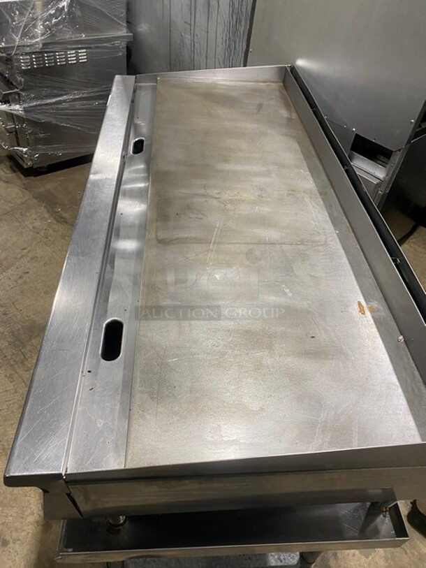 WOW! Garland Heavy Duty Commercial Countertop Gas Powered Flat Griddle! 1 Inch Thick Plate!  With Back And Side Splashes! On Equipment Stand! With Storage Space Underneath! All Stainless Steel! On Casters! Working When Removed! - Image 5 of 8