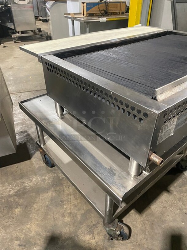 Bakers Pride Commercial Countertop Natural Gas Powered 48 Inch Char Broiler Grill! On Commercial 60 Inch Equipment Stand! With Underneath Storage Space! All Stainless Steel! On Casters! Working When Removed! Model XX8 Serial 592381707002!  - Image 3 of 10