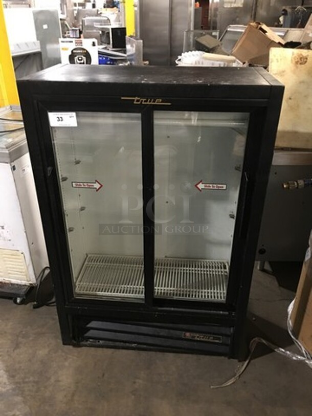 True Commercial 2 Door Reach In Refrigerator Merchandiser! With View Through Sliding Doors! With Poly Coated Racks! Model: GDM33SSL54 SN: 5016979 115V 60HZ 1 Phase