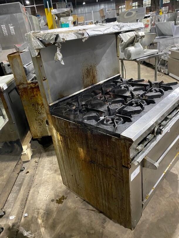 WOW! DCS Commercial Natural Gas Powered 6 Burner Stove! With Full Size Oven Underneath! With Backsplash & Overhead Salamander Shelf! All Stainless Steel! On Casters! WORKING WHEN REMOVED! - Image 2 of 9