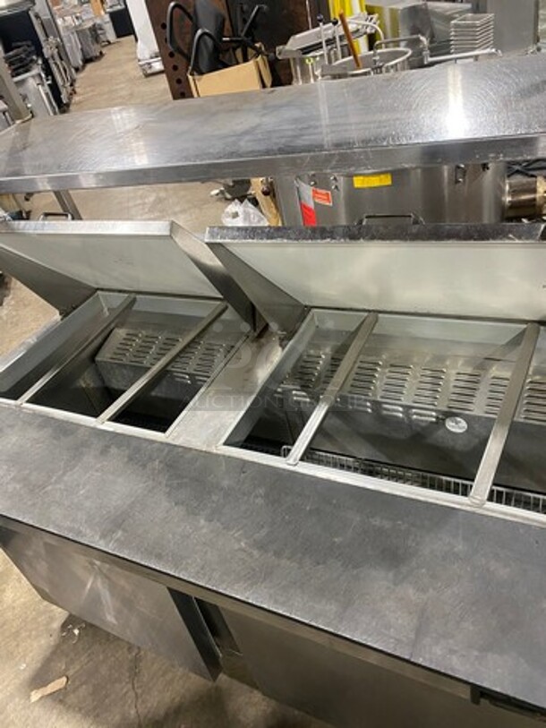 Continental Commercial Refrigerated Sandwich Prep Table! With Double Over Head Shelf! With 2 Door Underneath Storage Space! With Poly Coated Racks! All Stainless Steel! Model: SW6024M Serial 15713729! 115V 1Phase! On Casters!
 - Image 5 of 10