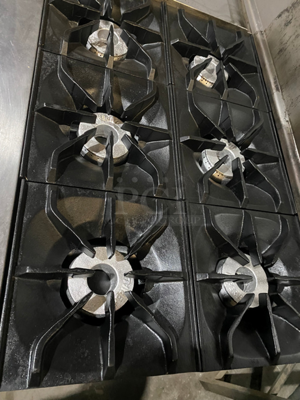 SWEET! Imperial Commercial Natural Gas Powered 6 Burner Stove With Left Side Flat Top Griddle! 2 Full Size Ovens Underneath! With Metal Oven Racks! Left Side Splash And Raised Back Splash! All Stainless Steel! On Casters! - Image 6 of 11