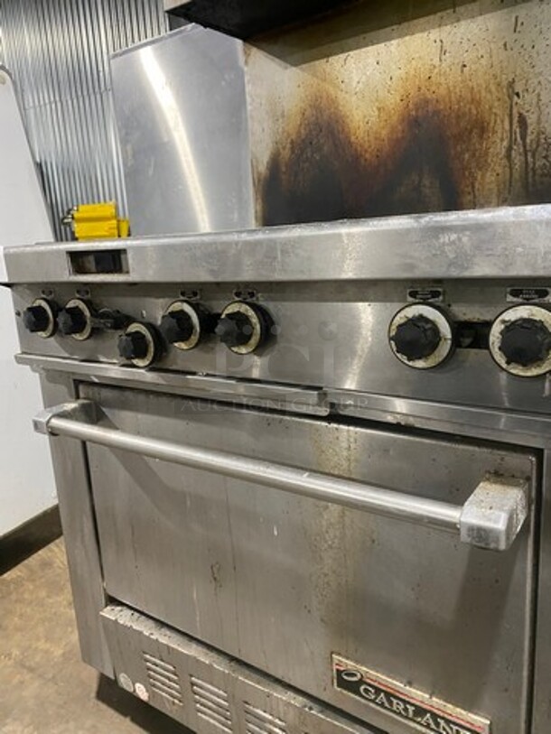Garland Commercial Natural Gas Powered 6 Burner Stove! With Raised Backsplash & Overhead Salamander Shelf! With Convection Oven Underneath! All Stainless Steel! Model H286RC Serial 0303RG0779! On Casters! WORKING WHEN REMOVED! - Image 8 of 12