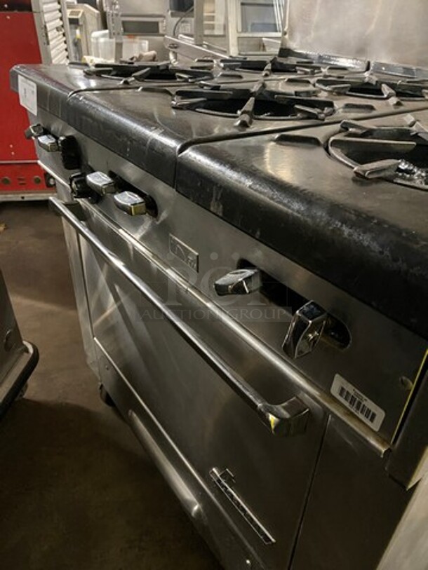 Garland Commercial Natural Gas Powered 6 Burner Stove! With Raised Back Splash And Salamander Shelf! With Oven Underneath! All Stainless Steel! On Casters! WORKING WHEN REMOVED! - Image 6 of 10