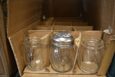 12 BRAND NEW IN BOX! Seasoning Shakers. 2.5x2.5x3.5. 12 Times Your Bid!
