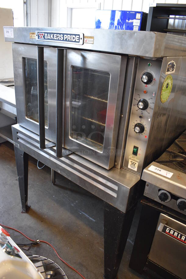 Bakers Pride Cyclone Series Stainless Steel Commercial Natural Gas Powered Full Size Convection Oven w/ View Through Doors, Metal Oven Racks and Thermostatic Controls on Metal Legs. 39x39x57