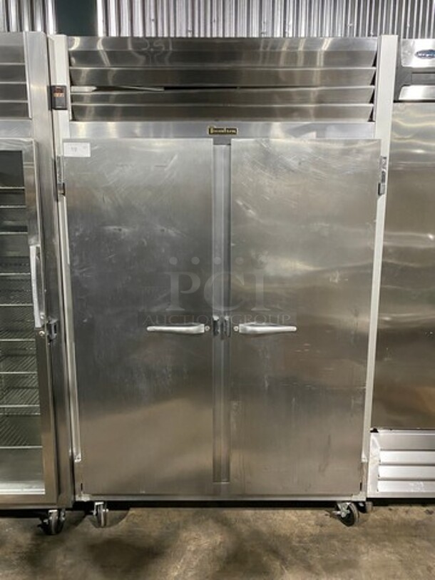 Traulsen 2 Door Reach In Freezer Unit! With Poly Coated Racks! All Stainless Steel! On Casters! Model: G22010 SN: T177456A12 115V 60HZ 1 Phase