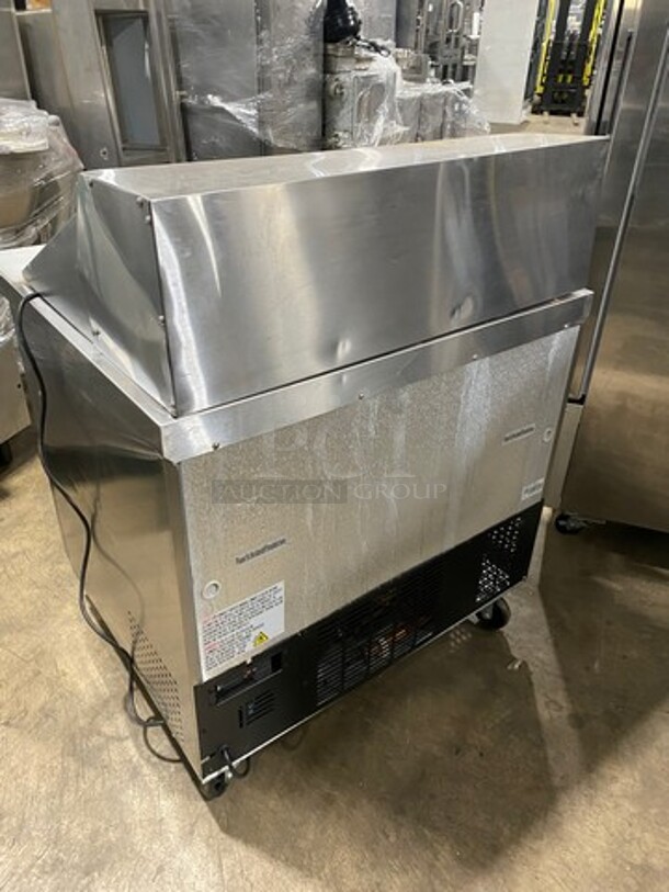 Universal Coolers Commercial Refrigerated Sandwich Prep Table! With 2 Door Storage Space Underneath! With Poly Coated Rack! All Stainless Steel! On Casters! - Image 4 of 10