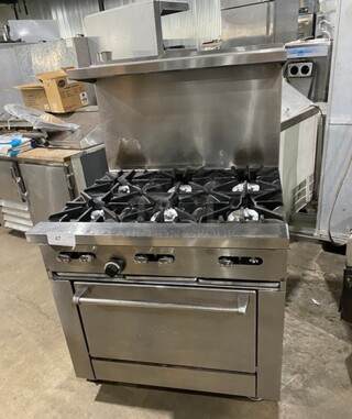 Nice! Sunfire All Stainless Steel Natural Gas 6 Burner Stove! With an Underneath Full Size Stove! Raised Back Splash And Salamander Shelf! On Casters!