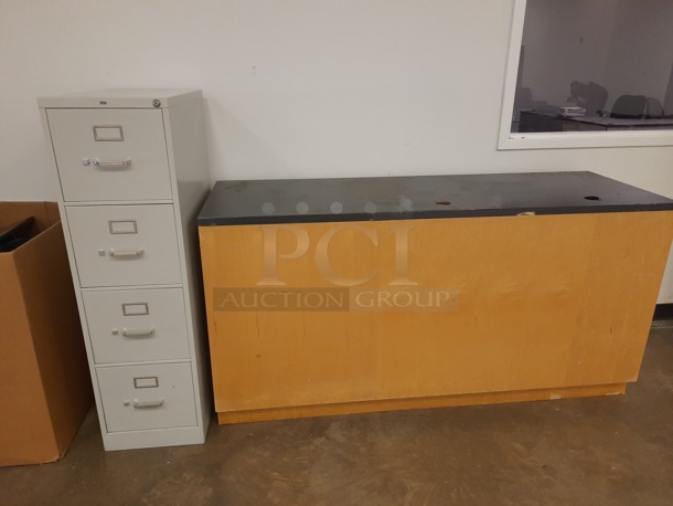 Filing Cabinet and Wooden Unit.
15X26.5X52 and 72X24X3. 2 Times Your Bid! (Main Building) 