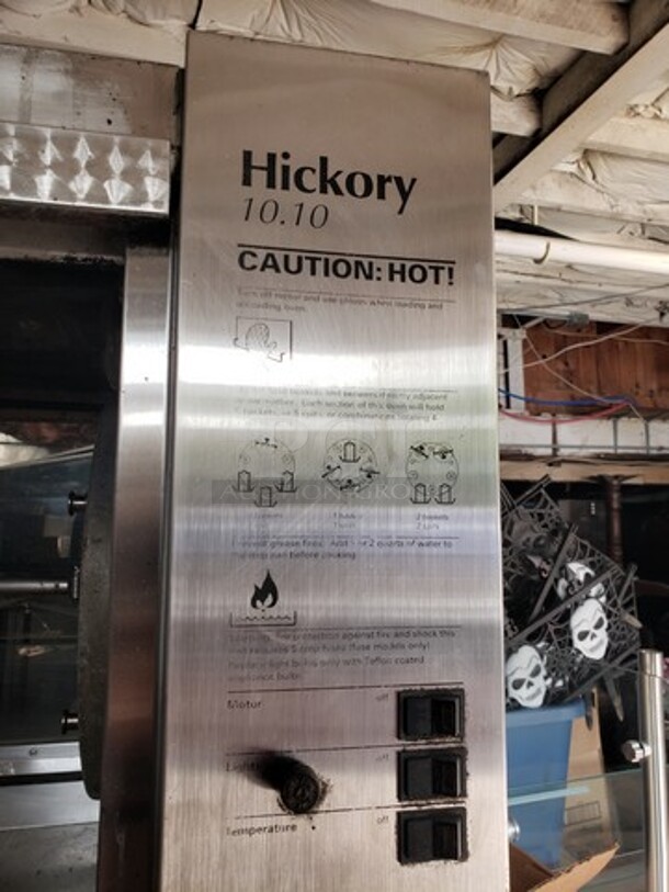 Hickory 10.10E Electric Rotisserie Oven on Casters! Left side of the oven has a small dent. Missing one knob and one knob is broken and needs to be replaced. 

Motor 120V, 1PH
Heating Elements 208V, 3PH - Image 2 of 10