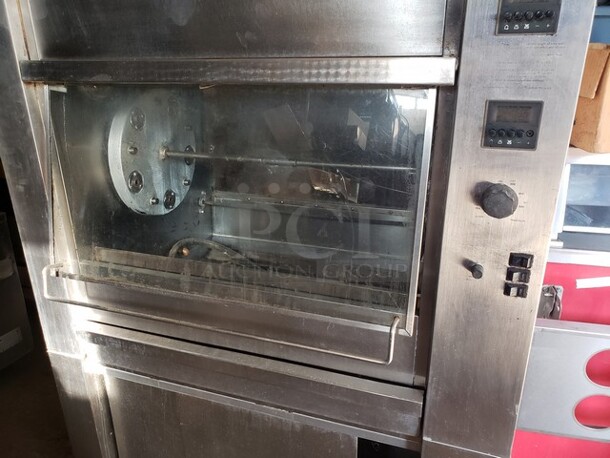 Hickory 10.10E Electric Rotisserie Oven on Casters! Left side of the oven has a small dent. Missing one knob and one knob is broken and needs to be replaced. 

Motor 120V, 1PH
Heating Elements 208V, 3PH - Image 4 of 10