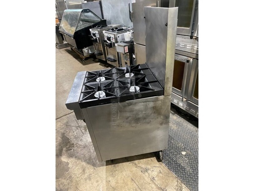 Nice! Extra Clean! Southbend All Stainless SteelNatural Gas Powered 4 Burner Oven/Range With Raised BackSplash! With Oven Underneath! On Caster Wheels! Working When Removed!  - Image 4 of 9