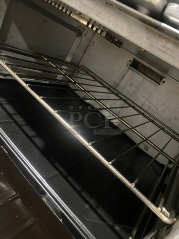 Sunfire Commercial Natural Gas Powered 6 Burner Stove! With Raised Back Splash And Salamander Shelf! With Oven Underneath! All Stainless Steel! On Casters! - Image 8 of 10