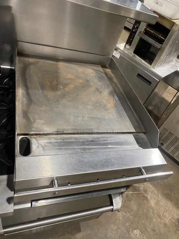 BEAUTIFUL! Garland Commercial Natural Gas Powered 6 Burner Stove With Raised Right Side Flat Griddle & Cheese Melter! Griddle Has Side Splashes! With Raised Back Splash And Salamander Shelf! With 2 Full Size Ovens Underneath! With Metal Oven Racks! All Stainless Steel! On Casters! - Image 7 of 9