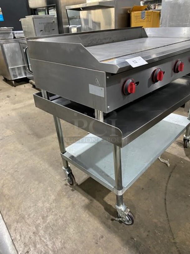 WOW! LATE MODEL! Entree Commercial Natural Gas Powered Flat Top Griddle! With Back And Side Splashes! On Equipment Stand! All Stainless Steel! On Casters! Model: GR48N SN: 21041176V - Image 2 of 9