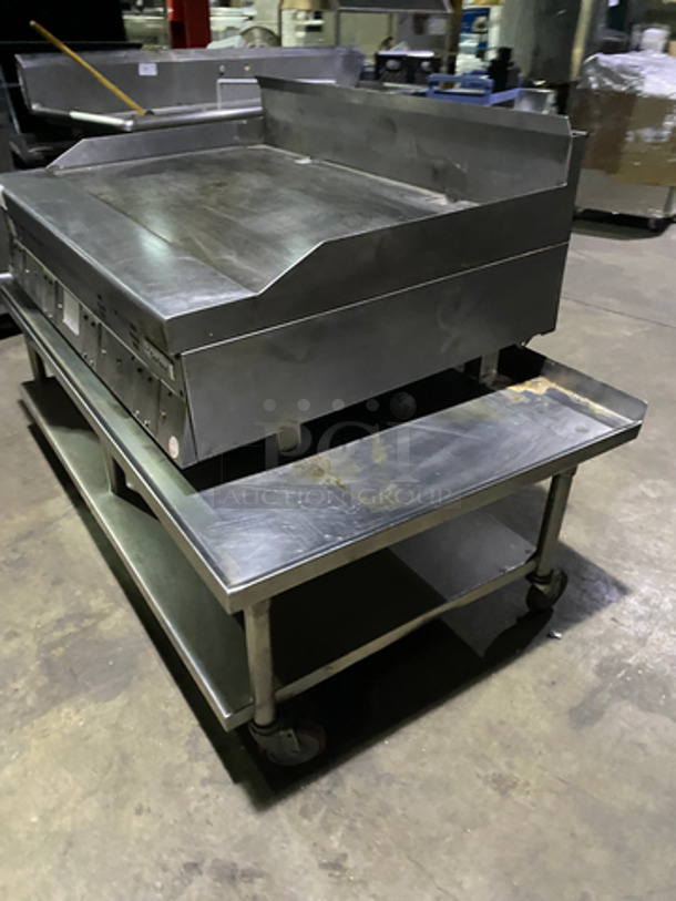 MUST HAVE! Garland Commercial Countertop Natural Gas Powered Heavy Duty Plancha Flat Grill! With Back And Side Splashes! On Heavy-Duty Stainless-Steel Equipment Stand! With Underneath Storage Space! On Casters! - Image 2 of 10