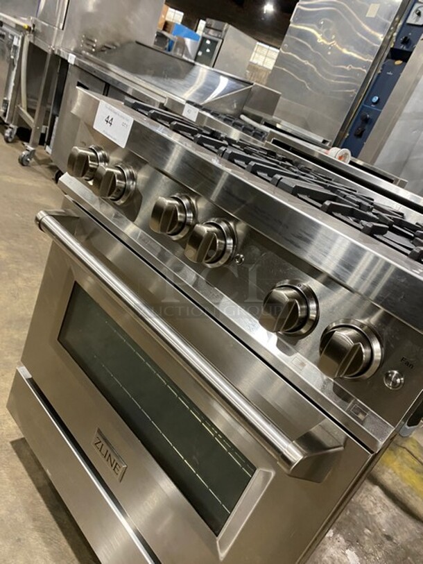 Zline Commercial Gas Powered 4 Burner Stove! With Oven Underneath! Stainless Steel! On Legs! MODEL RG30 SN:20062976049 120V  - Image 7 of 10