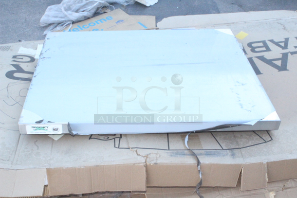 BRAND NEW SCRATCH & DENT! Regency 24" x 30" 16-Gauge 304 Stainless Steel Commercial Open Base Work Table. Out of Original Packaging.  - Image 2 of 4