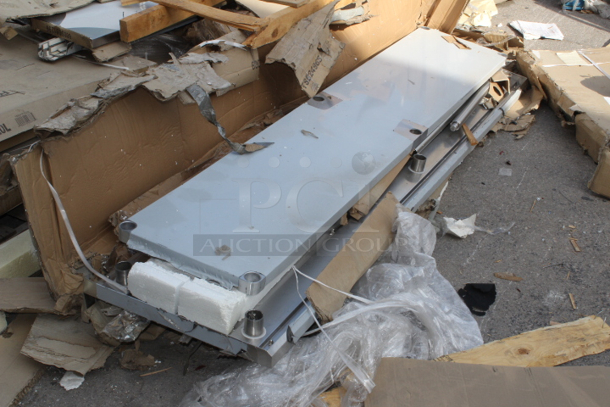 BRAND NEW SCRATCH & DENT! Regency 24" x 96" 16-Gauge Stainless Steel Commercial Work Table with 4" Backsplash and Undershelf. Packaging is damaged. May be missing screws. 	 - Image 4 of 5