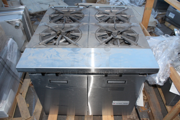 BRAND NEW SCRATCH & DENT! Garland / U.S. Range MST44S-E NAT Master Sentry Series Natural Gas 4 Burner 34" Range with Storage Base - 140,000 BTU. FEATURES: Electric ignition & flame fail on all burners *Thumbnail photo is shown with oven base please see additional photos. 	 - Image 2 of 6