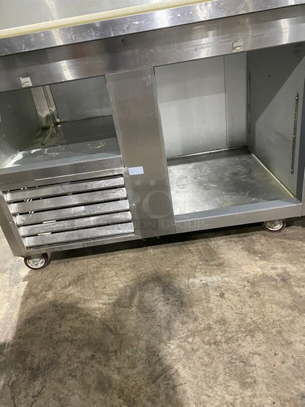 Leader! Stainless Steel Pizza Prep Table! Double Cold Storage! with/ Poly Cutting Board! On Wheels!
115V! 1 Phase! 60 HZ! - Image 5 of 9