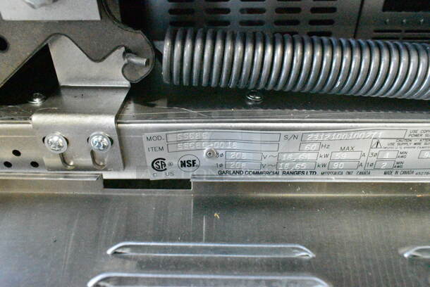 BRAND NEW SCRATCH AND DENT! 2023 Garland SS686 Stainless Steel Sentry Series 6 Sealed Burner Electric Restaurant Range with Standard Oven. 208 Volts, 3 Phase.  - Image 10 of 11
