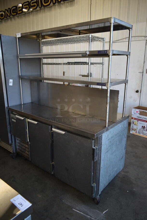 2013 Leader LB60 S/C Stainless Steel Commercial 3 Door Work Top Cooler w/ 2 Tier Over Shelf on Commercial Casters. 115 Volts, 1 Phase. Tested and Working! - Image 1 of 7