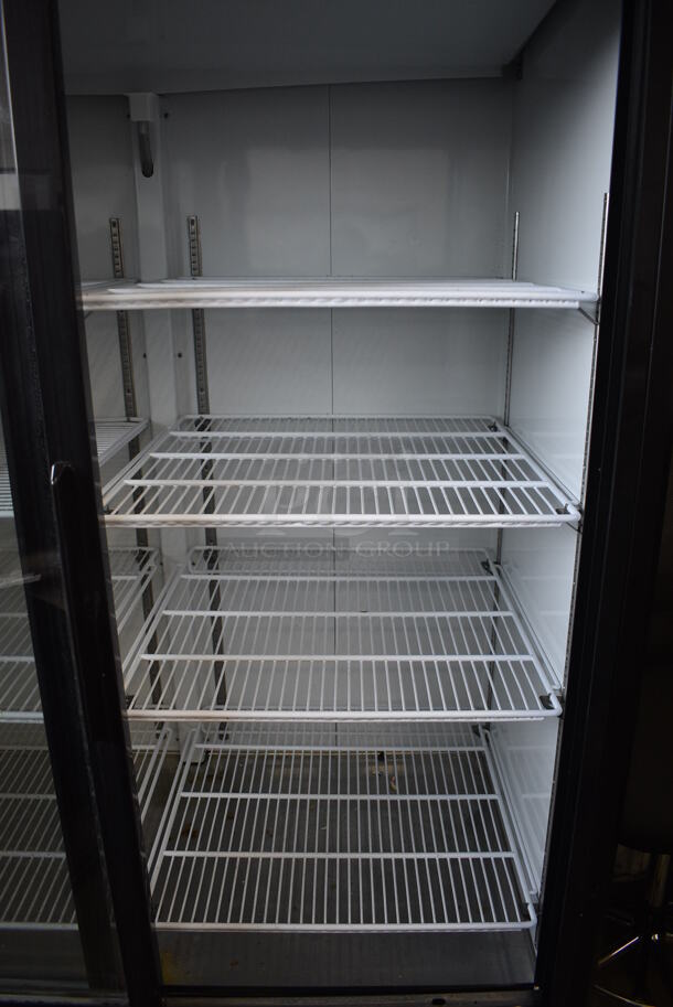 Avantco Model 178GDS47HCB Metal Commercial 2 Door Reach In Cooler Merchandiser w/ Poly Coated Racks on Commercial Casters. 115 Volts, 1 Phase. 52x32x83. Tested and Working! - Image 6 of 6