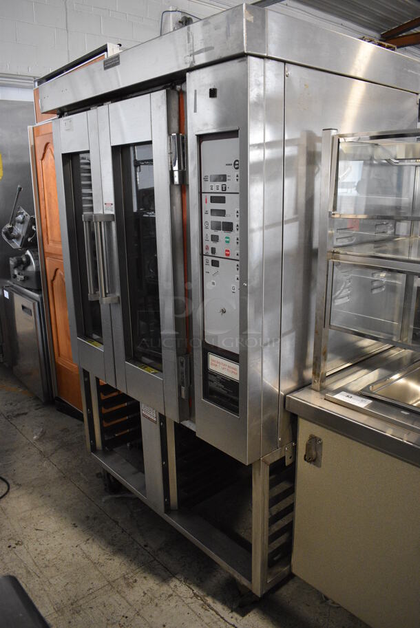 Stainless Steel Commercial Gas Powered Mini Rotating Rack Oven w/ View Through Doors and Lower Pan Rack on Commercial Casters. 48x36x75. Picture of the Unit Powered On Before Removal Is Included In the Listing. - Image 3 of 11