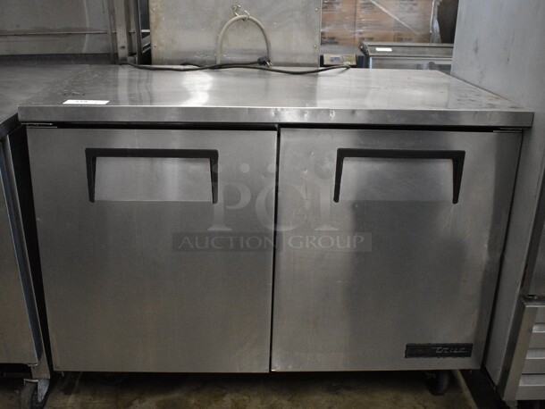2016 True Model TUC-48F-HC Stainless Steel Commercial 2 Door Undercounter Freezer on Commercial Casters. 115 Volts, 1 Phase. 48x30x36.5. Tested and Powers On But Does Not Get Cold