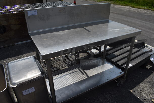 Stainless Steel Table w/ Back Splash and Metal Under Shelf on Commercial Casters. 48x24x47