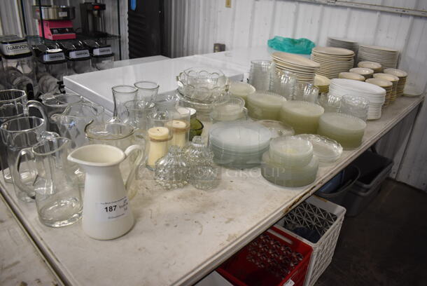 ALL ONE MONEY! Lot of Items on Tabletop Including Glass Plates, Ceramic Plates and Pitchers
