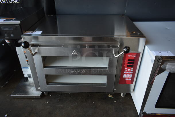 BRAND NEW SCRATCH AND DENT! Avantco 177DDPO18DSM Stainless Steel Commercial Countertop Electric Powered Pizza Oven w/ Cooking Stones. 240 Volts, 1 Phase. 