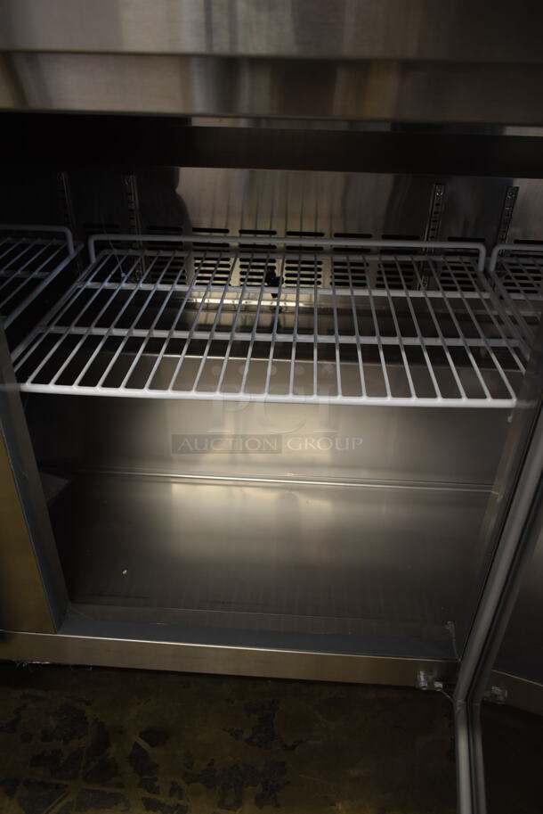 BRAND NEW SCRATCH AND DENT! 2023 Avantco 178SSUC72RHC Stainless Steel Commercial 3 Door Undercounter Cooler on Commercial Casters. 115 Volts, 1 Phase. Tested and Working! - Image 9 of 10