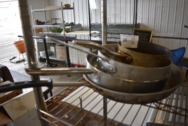 4 Various Metal Skillets. Includes 14.5x7.5x5. 4 Times Your Bid! - Image 1 of 3