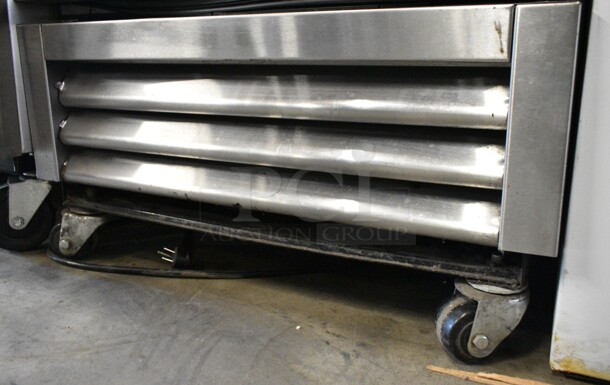 2017 True T-19F Stainless Steel Commercial Single Door Reach In Freezer w/ Poly Coated Racks on Commercial Casters. 115 Volts, 1 Phase. Tested and Powers On But Does Not Get Cold - Image 2 of 5